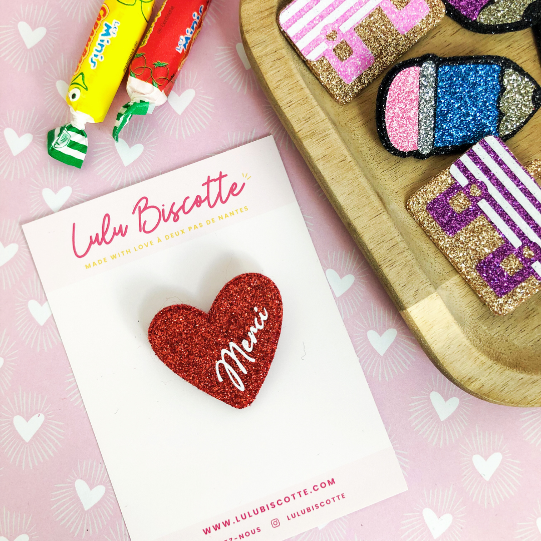 Broche pailletée "Merci"